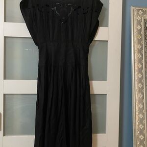 Vintage 
Elegant Black Midi Dress with Embroidered Detail